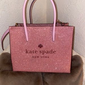 Kate Spade purse new with tags attached.